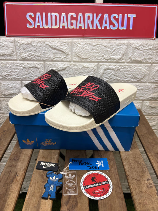 ADIDAS 100 THIEVES ADILETTE SLIDES Men